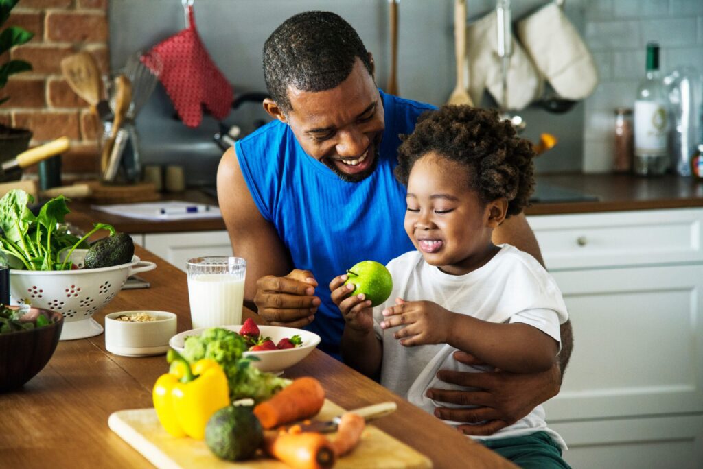 Dad and son cooking together